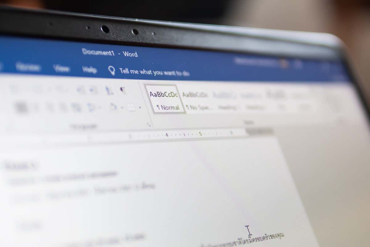 A close-up of a laptop screen displaying a document being edited, illustrating image.