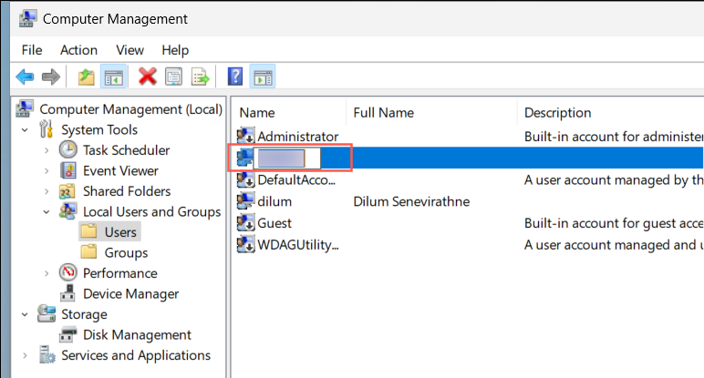 Renaming a user account in Computer Management.