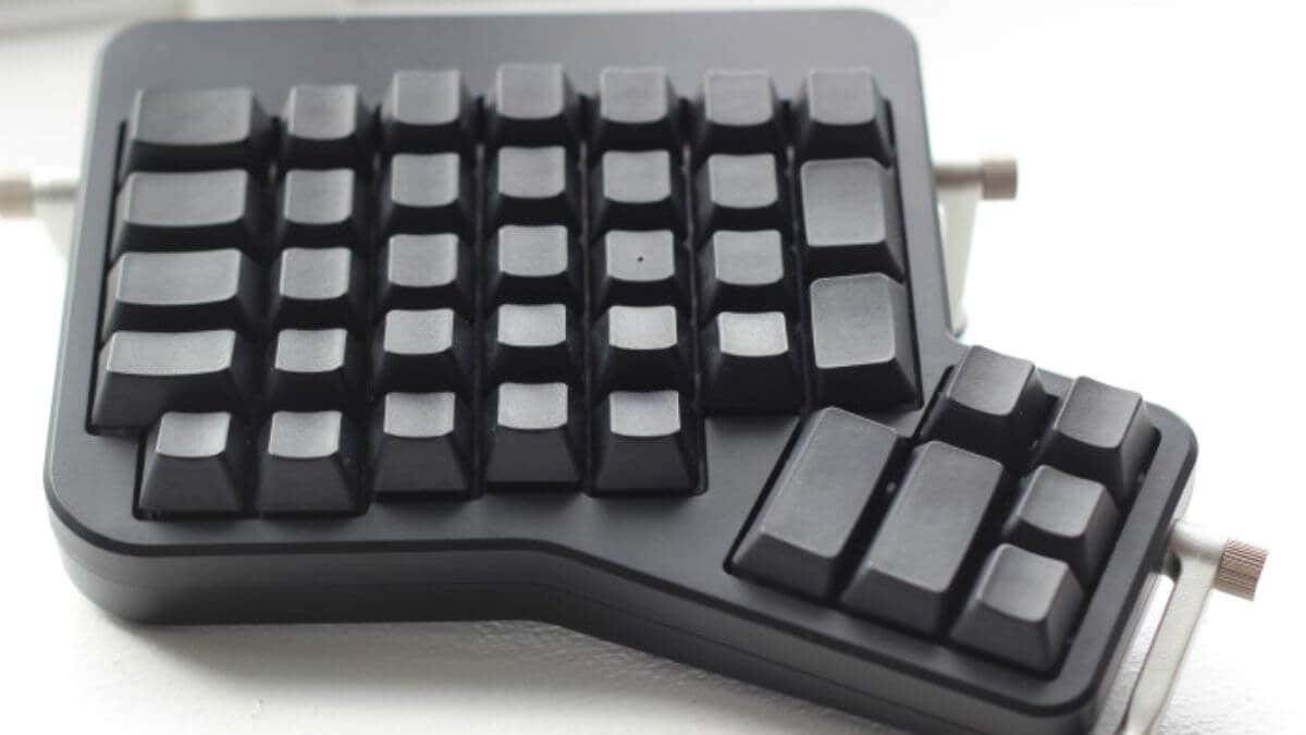 A black keyboard numpad with multiple keys, showcasing image.