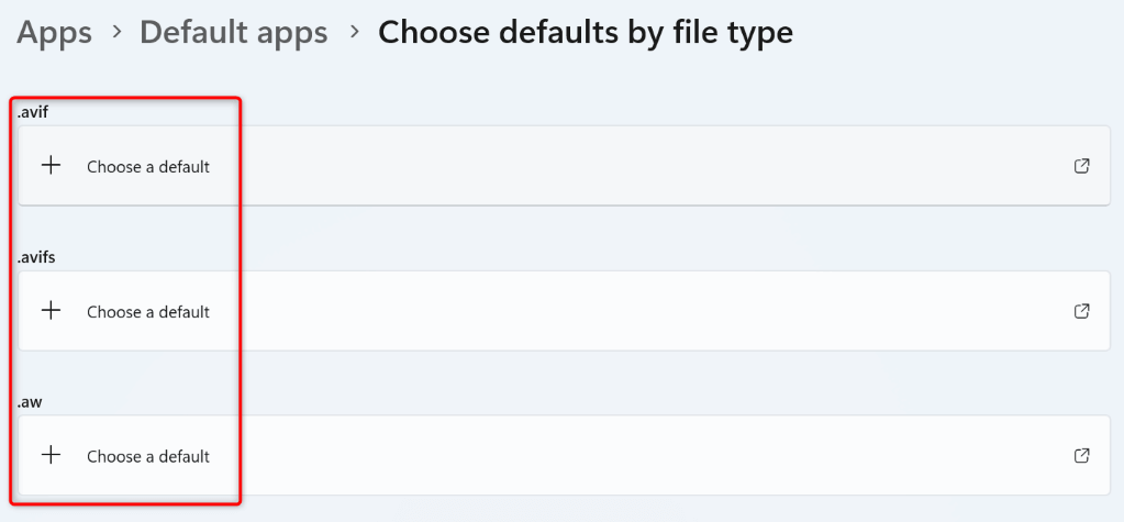 "Choose a default" highlighted for various file types in Windows 11 Settings.