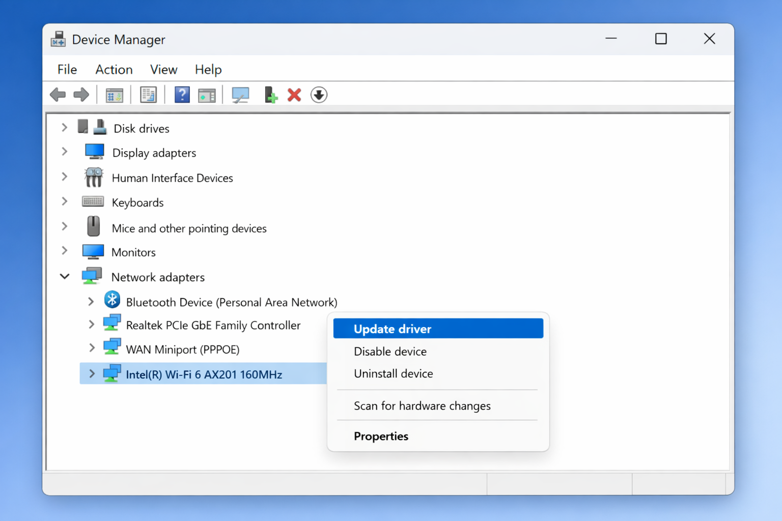 Device Manager showing Network adapters expanded with right-click context menu open on a wireless adapter