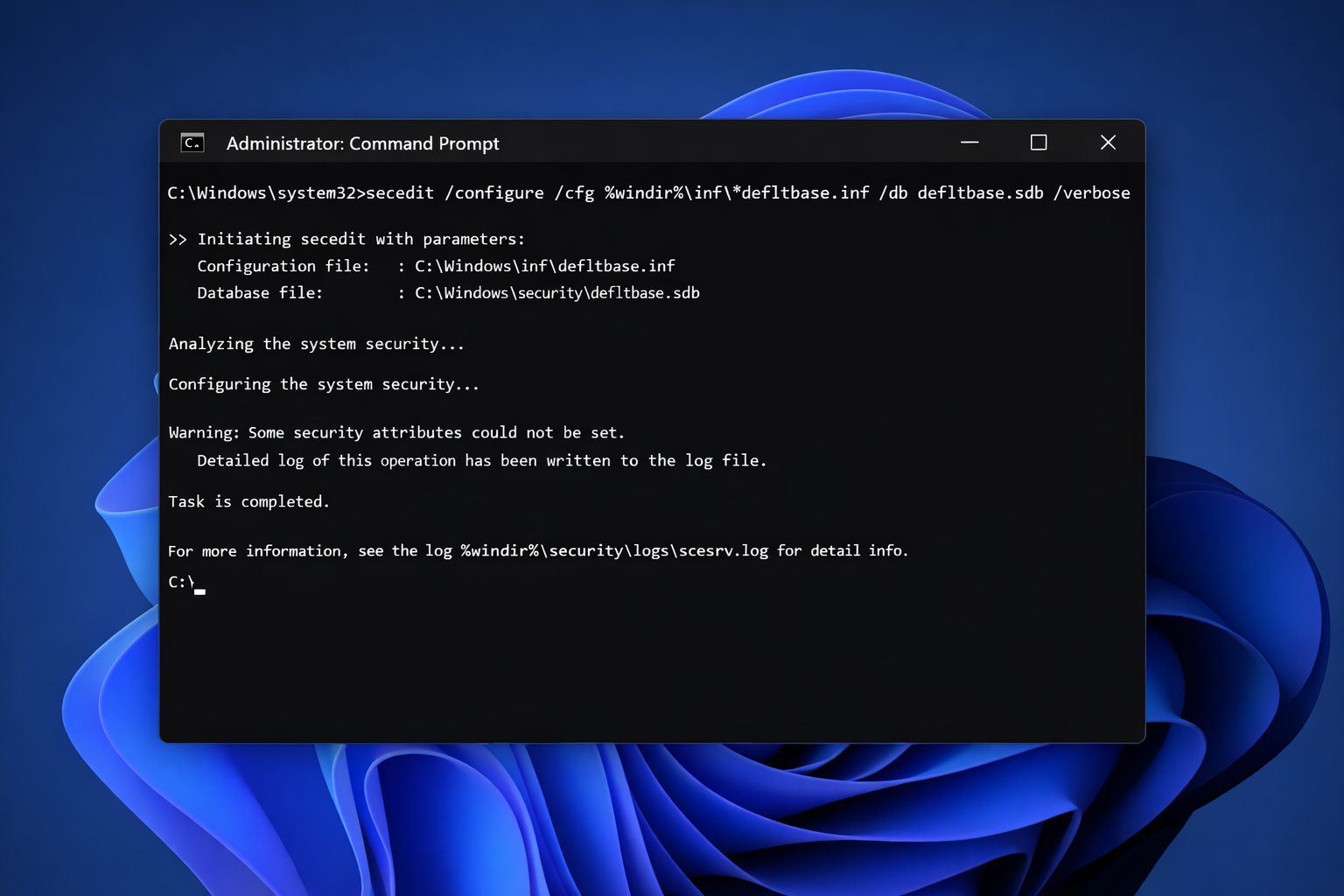 Administrator Command Prompt in Windows 11 with the secedit command entered and output text showing the reset process running
