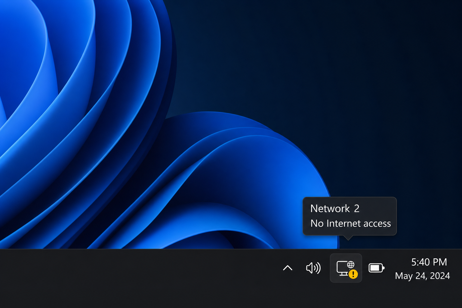 Windows 11 taskbar showing the Ethernet connected icon (no internet) in the system tray notification area