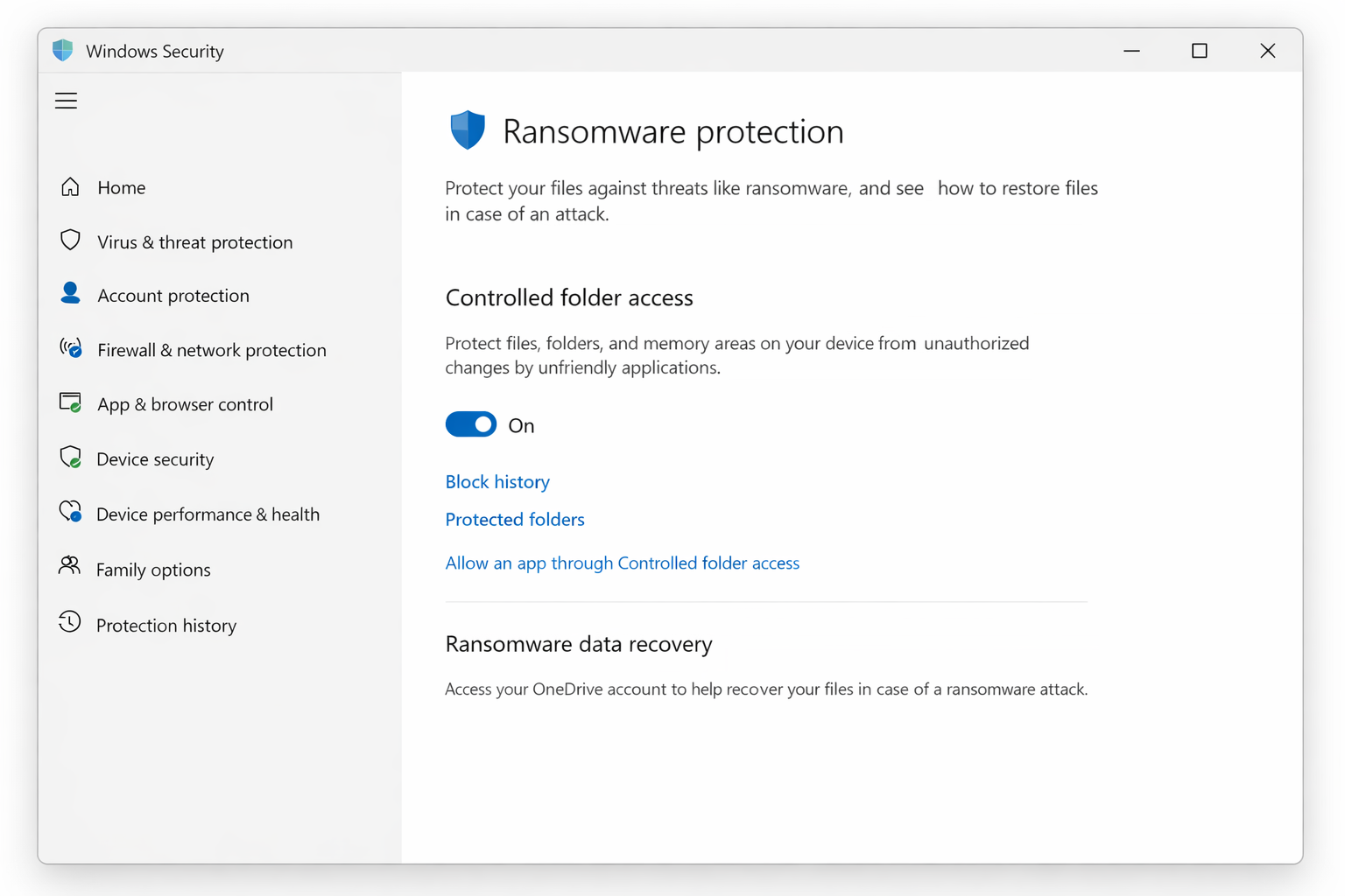Windows Security/> Virus & Threat Protection > Ransomware Protection panel showing the Controlled Folder Access toggle in the On position, with Protected folders and Allow an app through Controlled Folder Access links visible below