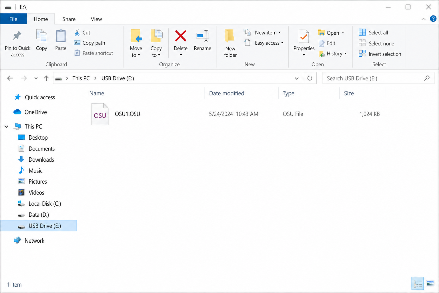 File Explorer showing the USB drive root with the OSU file placed directly at the top level with no subfolders visible