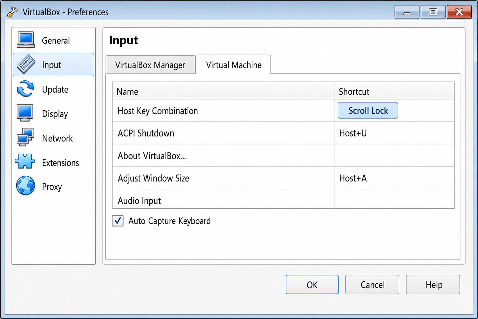VirtualBox Preferences Input tab with a new key (e.g. Scroll Lock) now shown in the Host Key Combination field, before clicking OK