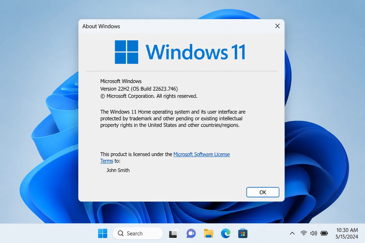 Windows 11 About Windows (winver) dialog showing the updated registered owner name after editing the registry