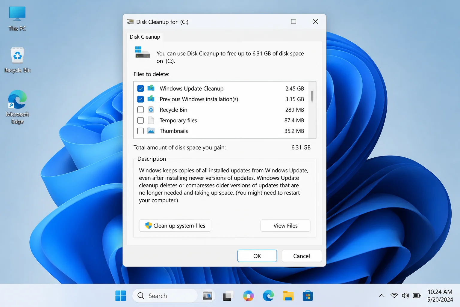 Disk Cleanup on Windows 11 showing "Windows Update Cleanup" and "Previous Windows installation(s)" checkboxes checked in the