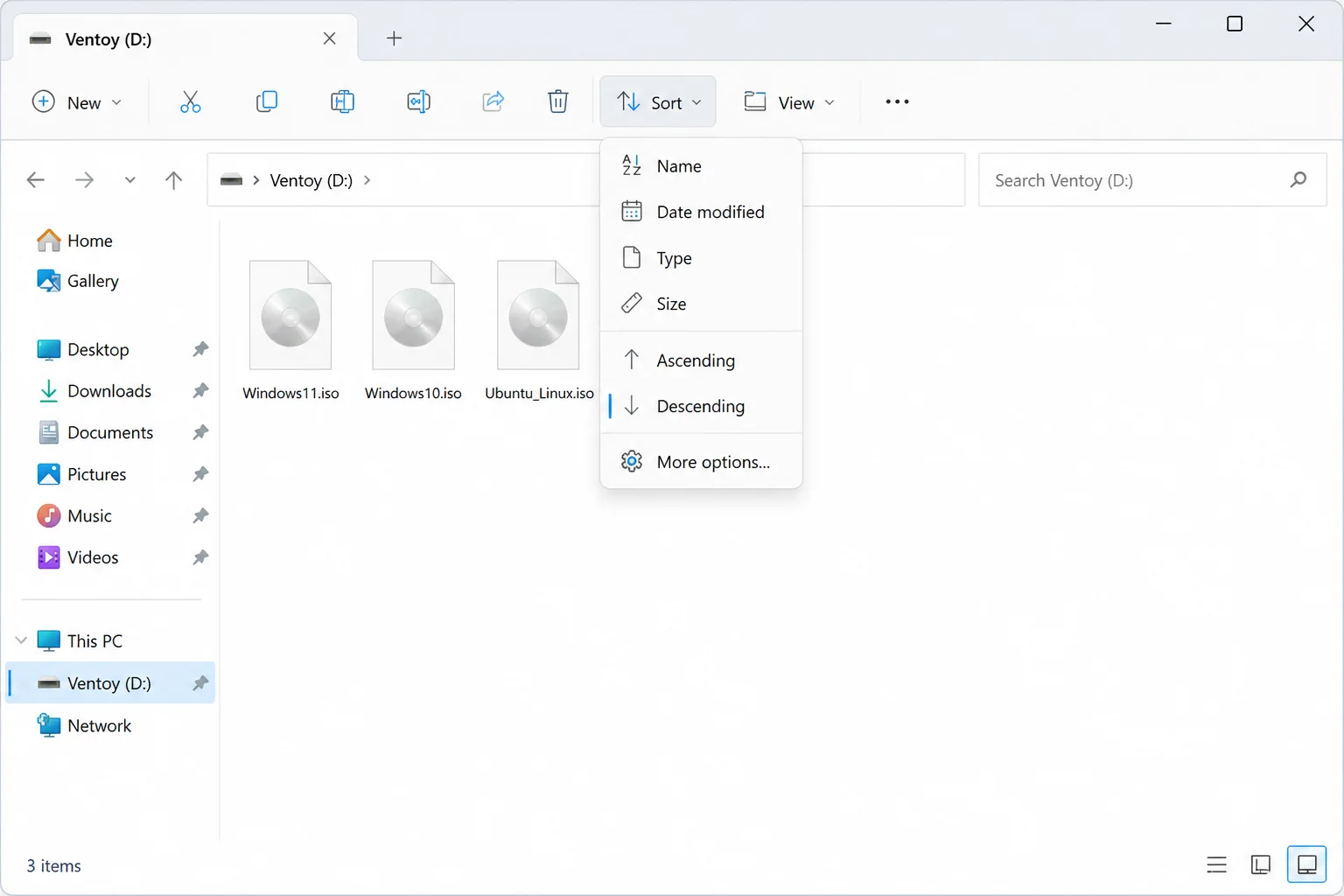 Windows 11 File Explorer showing a Ventoy USB drive with three ISO files in the root folder — a Windows 11 installer ISO, an
