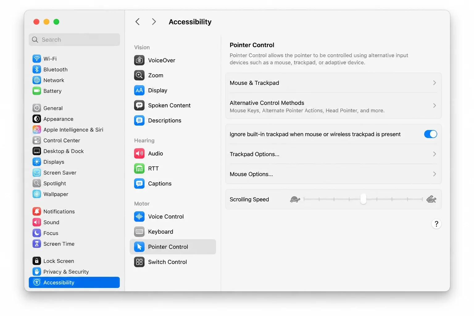 macOS System Settings > Accessibility > Pointer Control with the "Ignore built-in trackpad when mouse or wireless trackpad is present" toggle switched on