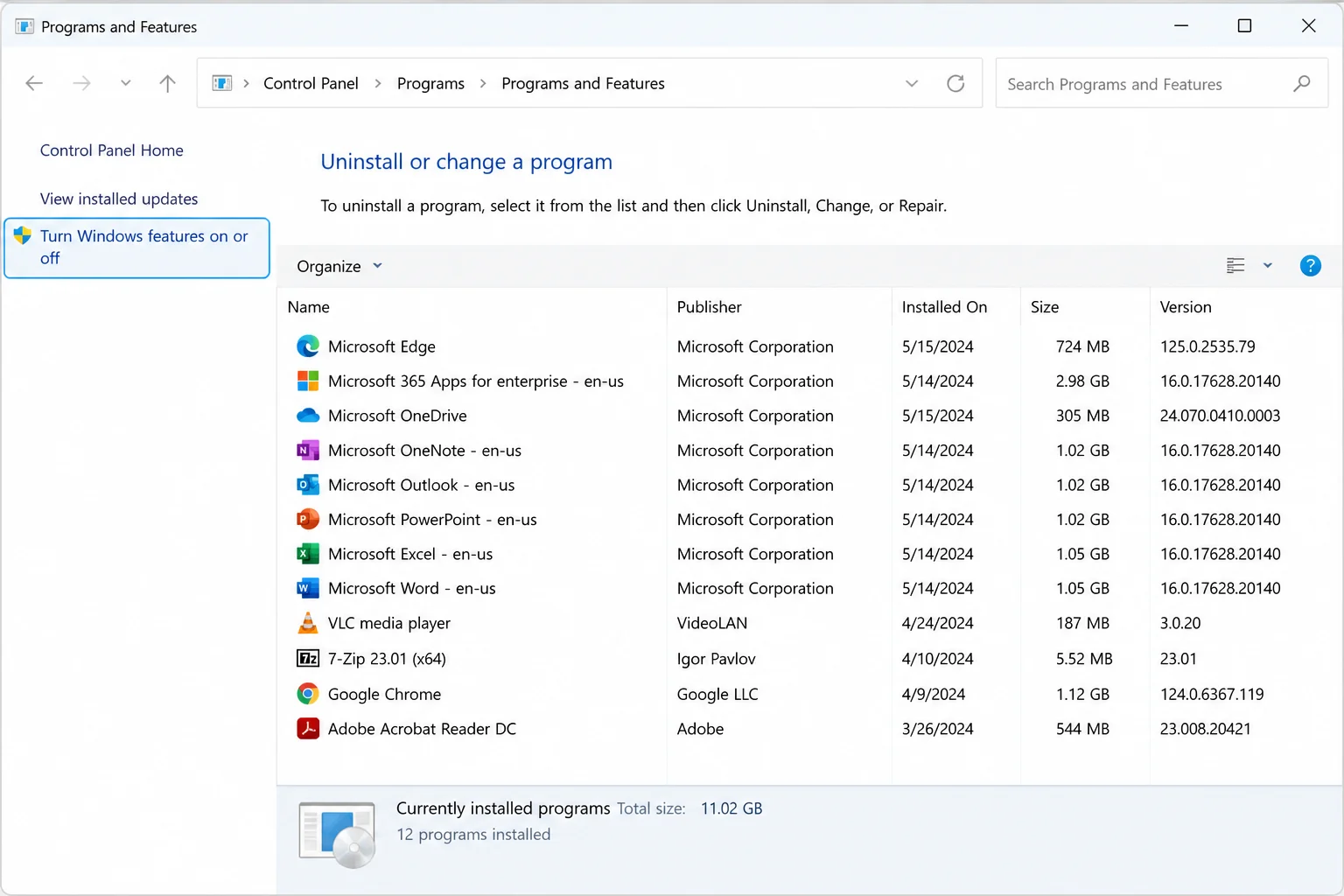 Windows 11 Control Panel Programs and Features with "Turn Windows features on or off" link visible in the left pane