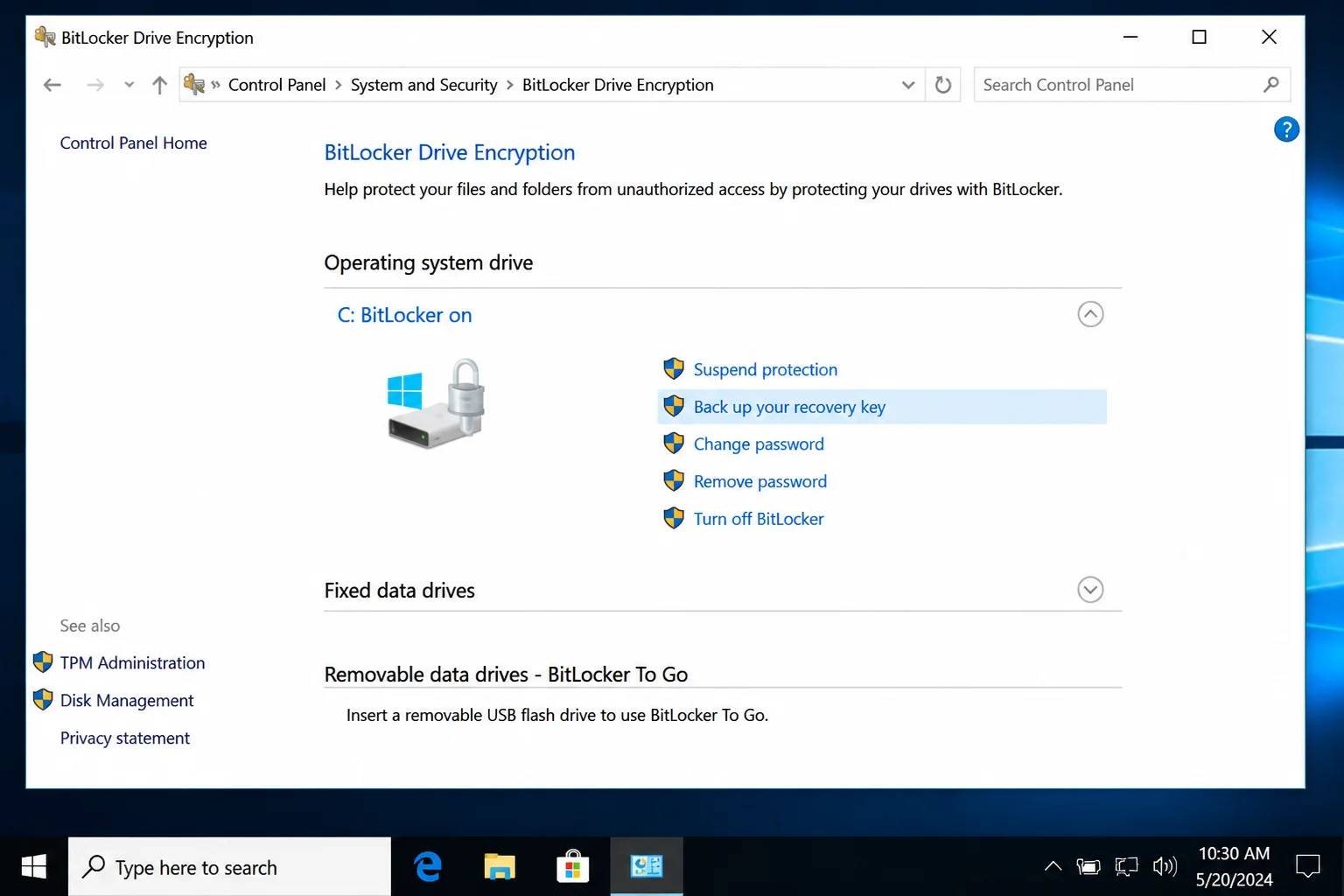 BitLocker Drive Encryption Control Panel with C drive status and Back up your recovery key highlighted
