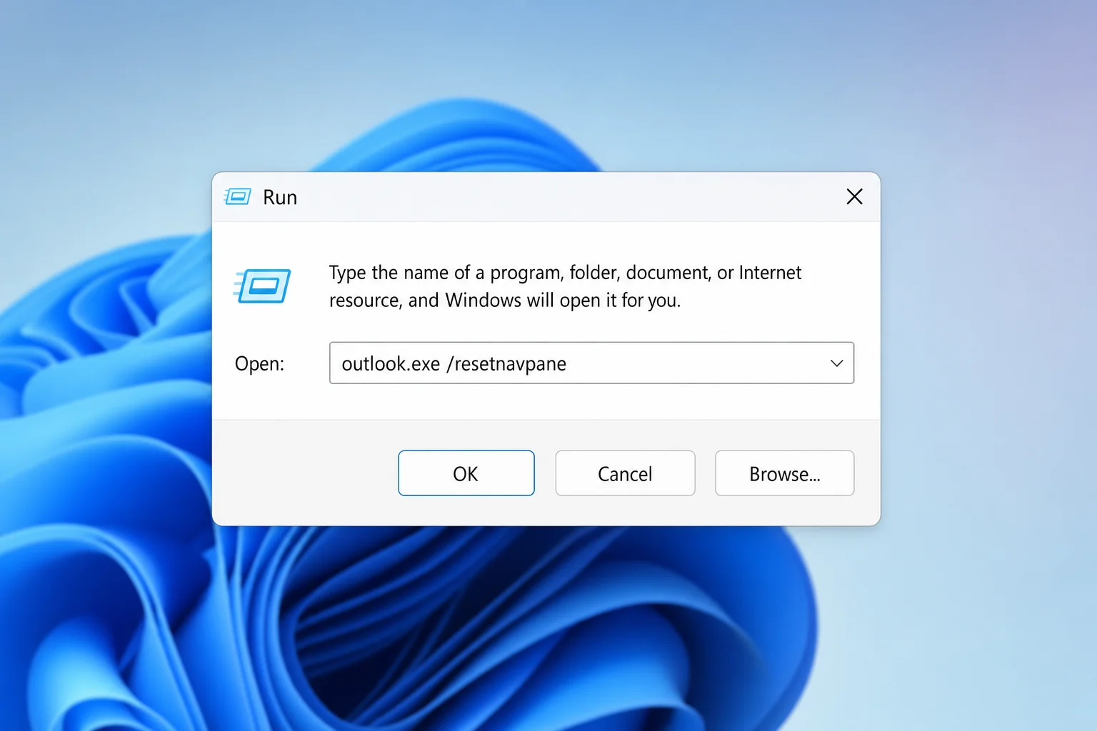 Windows Run dialog with "outlook.exe /resetnavpane" typed in the Open field