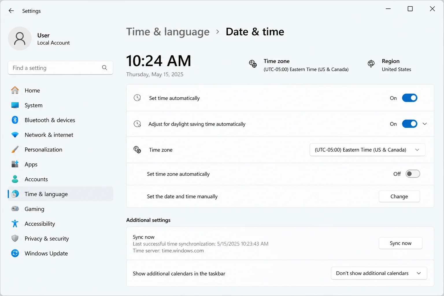 Windows 11 Settings > Time & Language > Date & time with "Set time automatically" toggled On and Sync now button visible