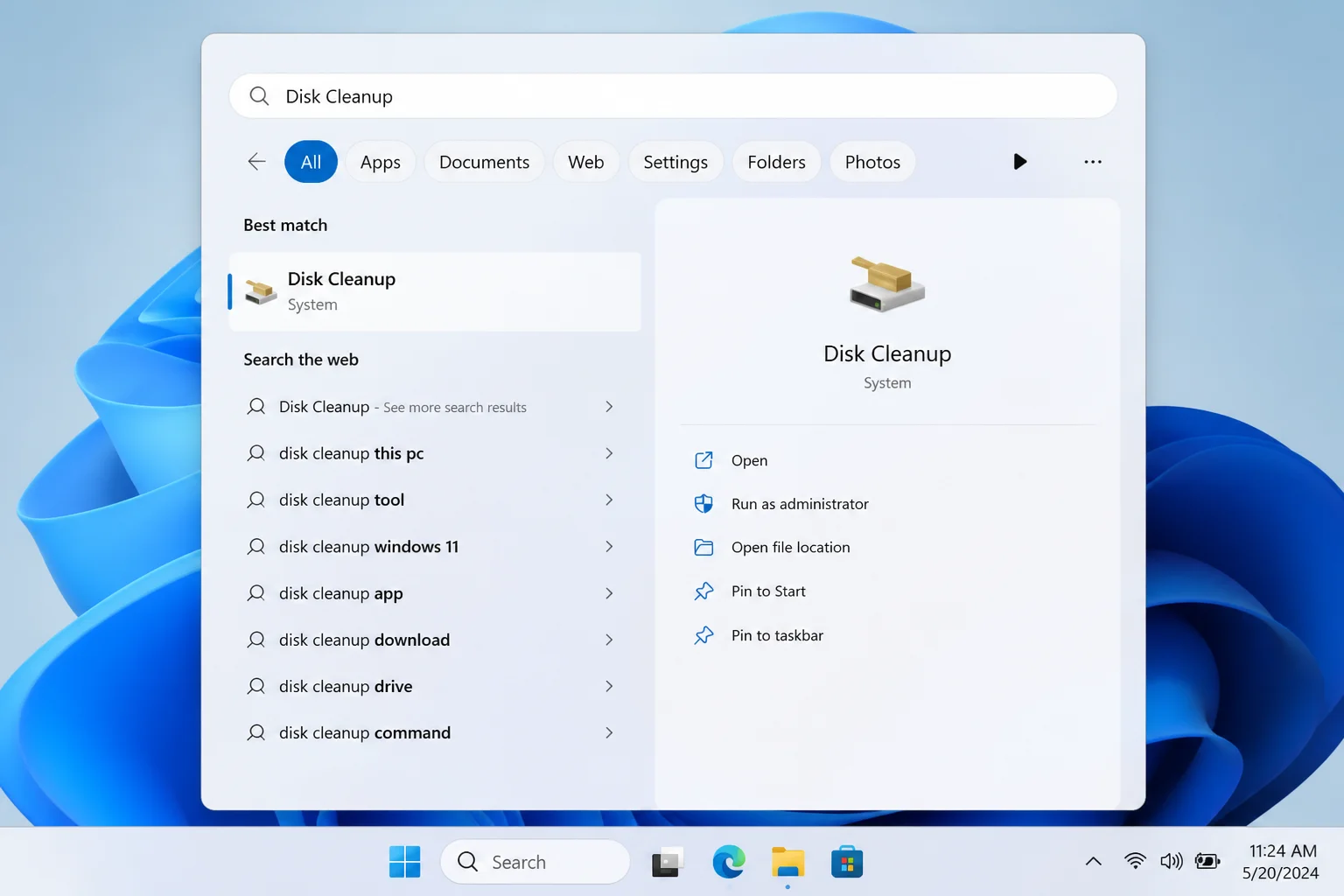 Windows 11 Start menu with "Disk Cleanup" typed in the search bar and the Disk Cleanup app highlighted as the top result