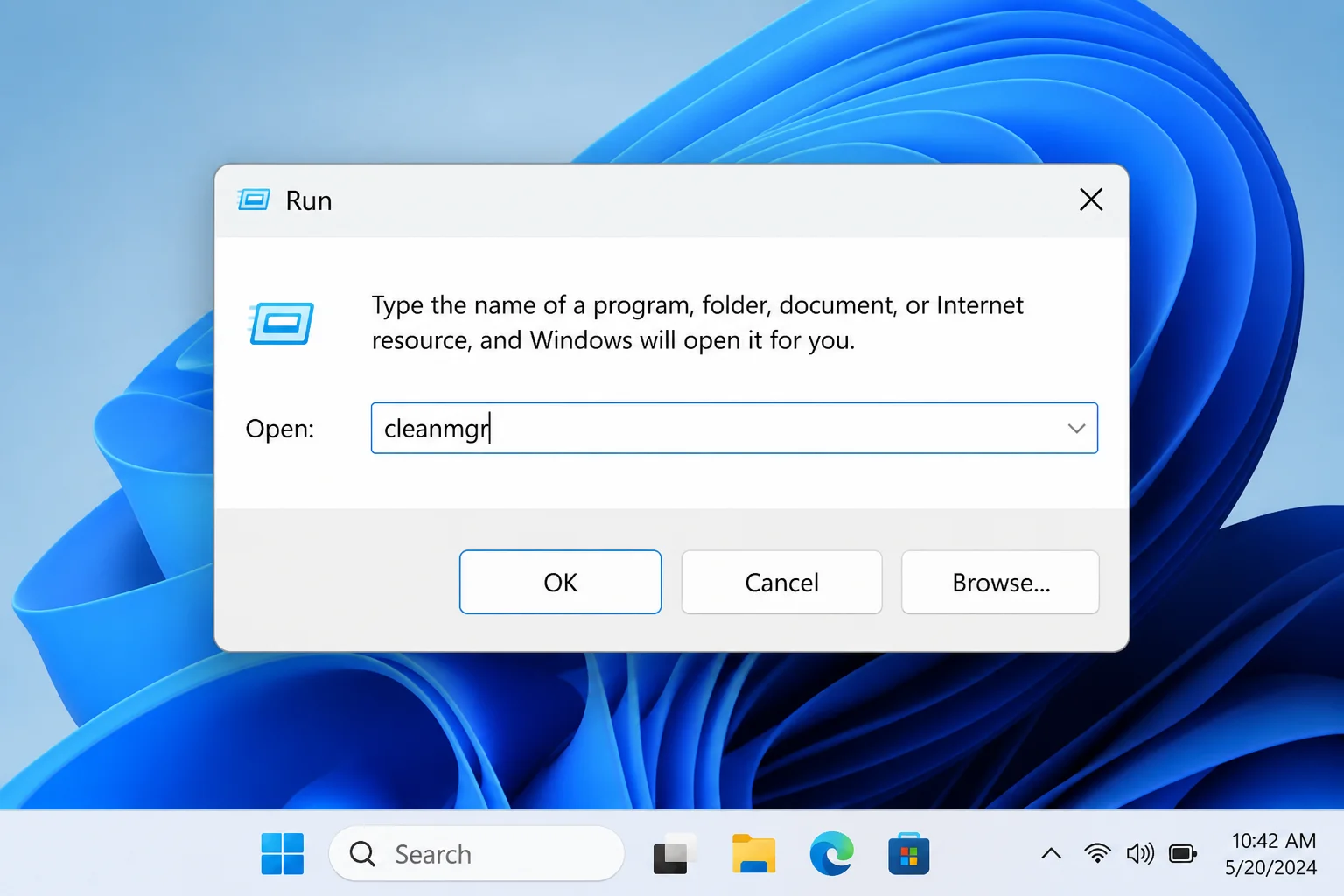Windows Run dialog with "cleanmgr" typed in the Open field