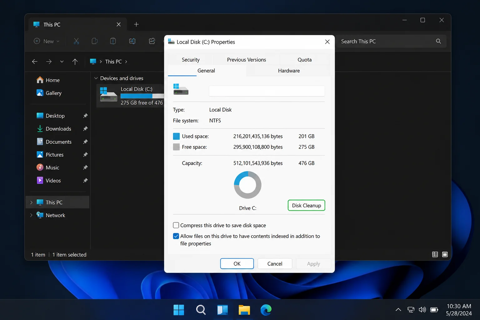 Windows 11 File Explorer showing the C: drive Properties dialog with the Disk Cleanup button highlighted on the General tab