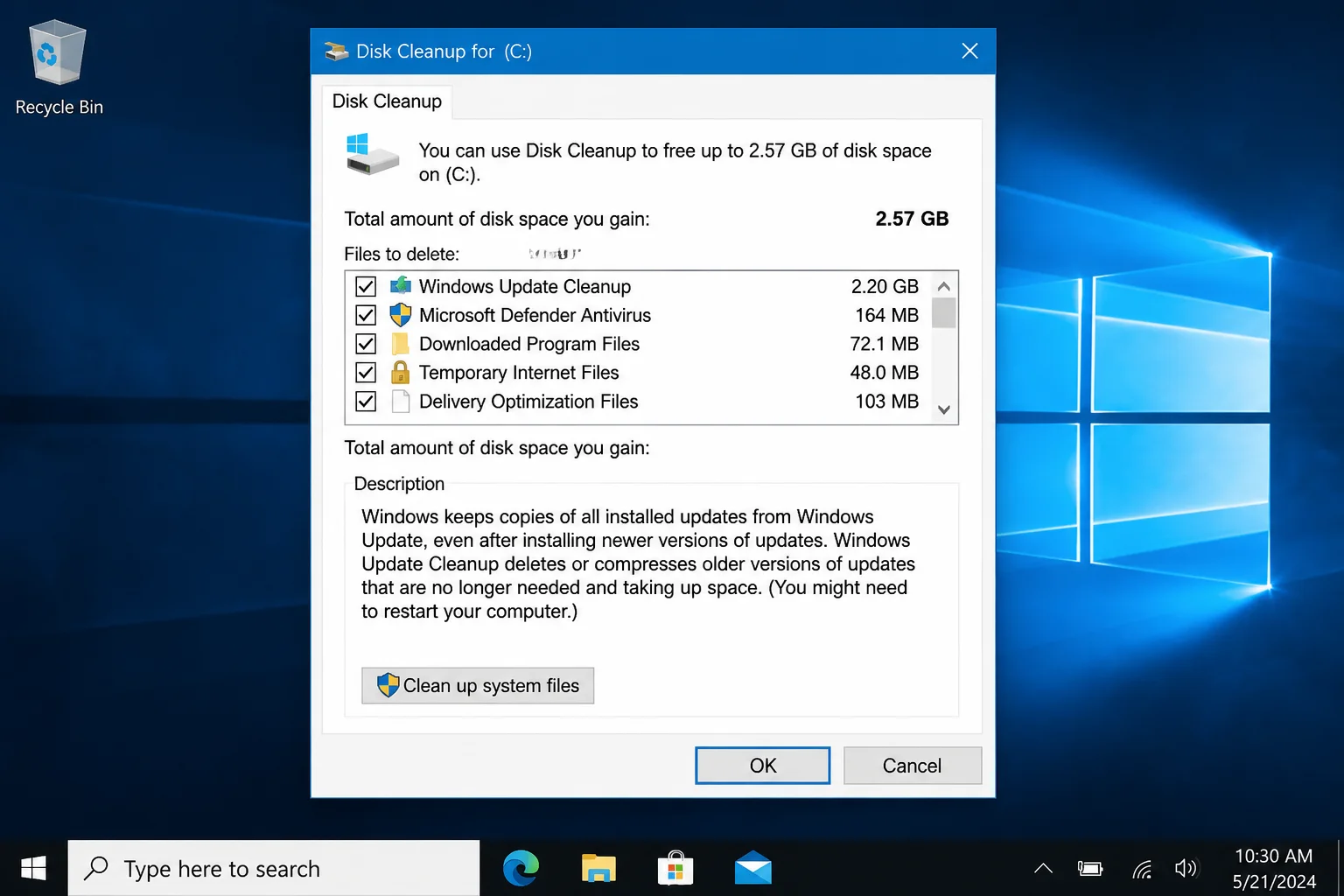 Disk Cleanup dialog after clicking "Clean up system files", showing additional categories including Windows Update Cleanup