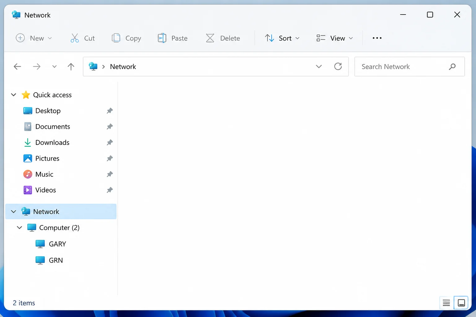File Explorer with the Network section expanded in the left sidebar, showing the local computer name listed under the
