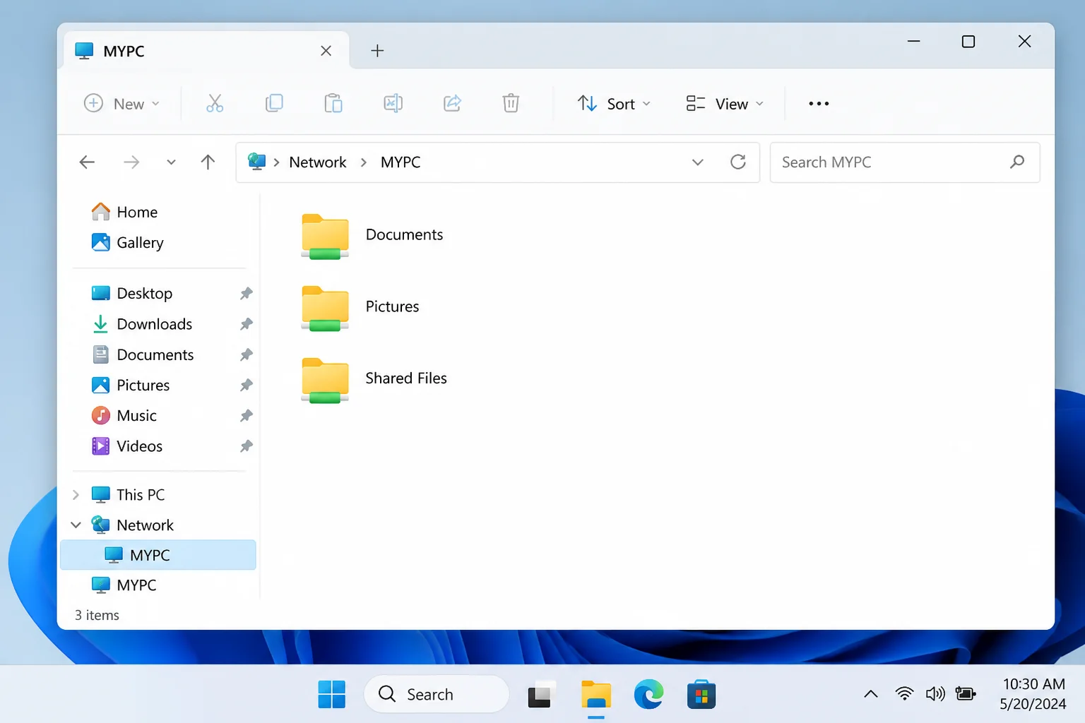 Windows 11 File Explorer Network view opened to the local PC, listing its shared folders in the main pane