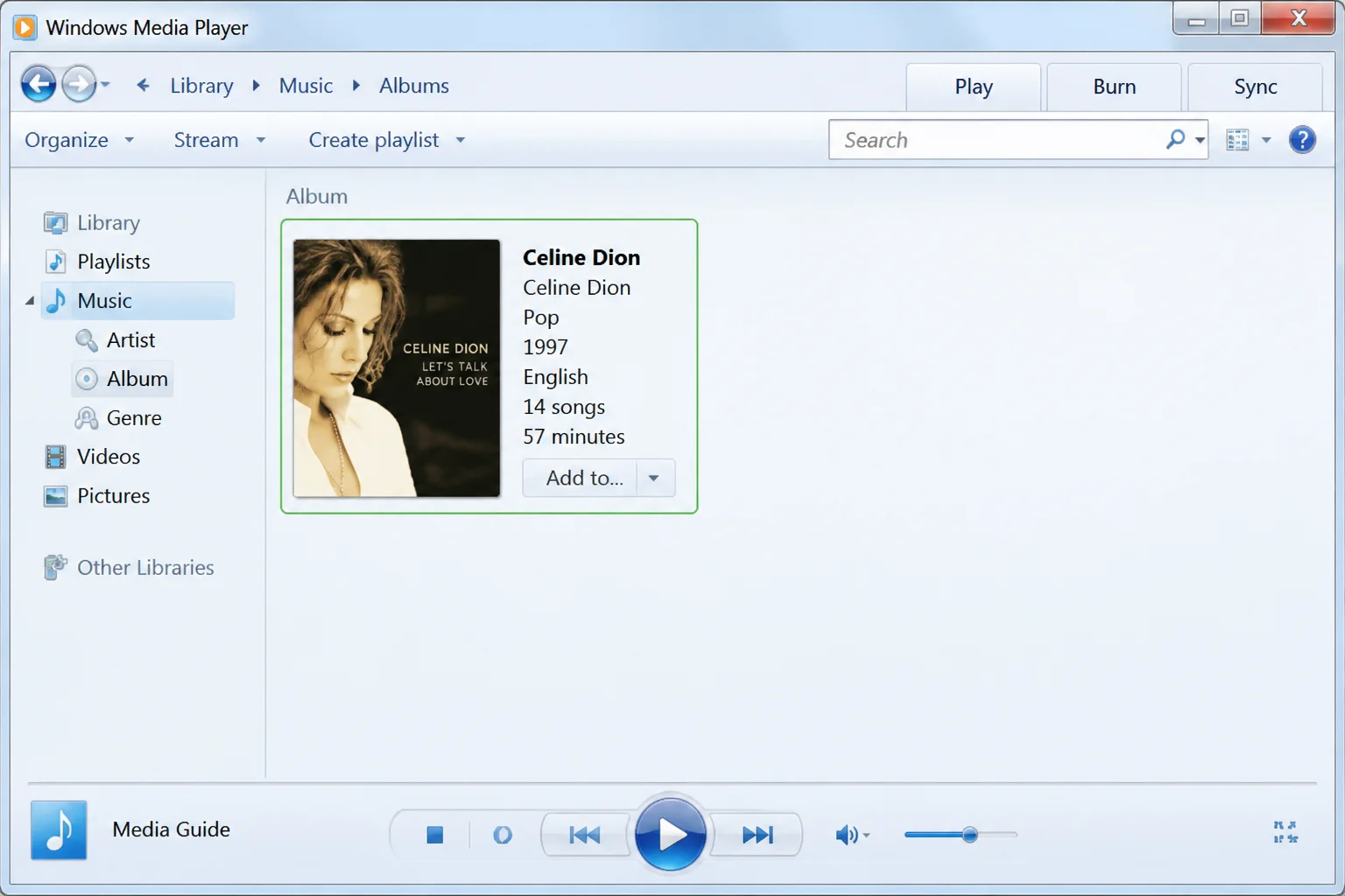 Classic Windows Media Player Music library view showing an album with its artwork thumbnail selected, ready to receive a