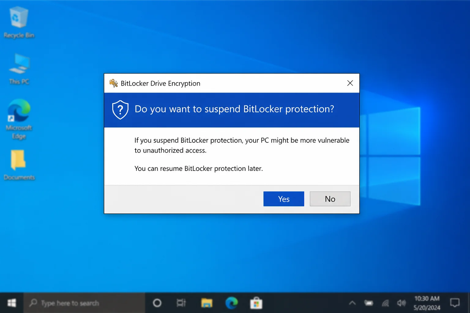 BitLocker Suspend protection confirmation prompt with the Yes button highlighted