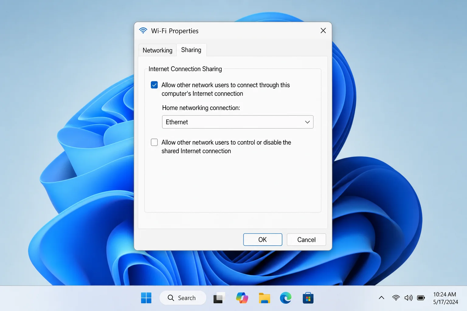 Windows 11 Network adapter Properties dialog open on the Sharing tab, with "Allow other network users to connect through this computer's Internet connection" checkbox checked and the Home networking connection dropdown visible