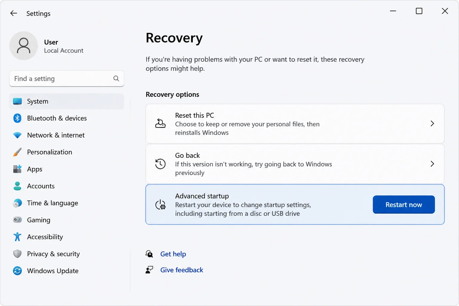 Settings > System > Recovery page with the Advanced startup section and Restart now button visible