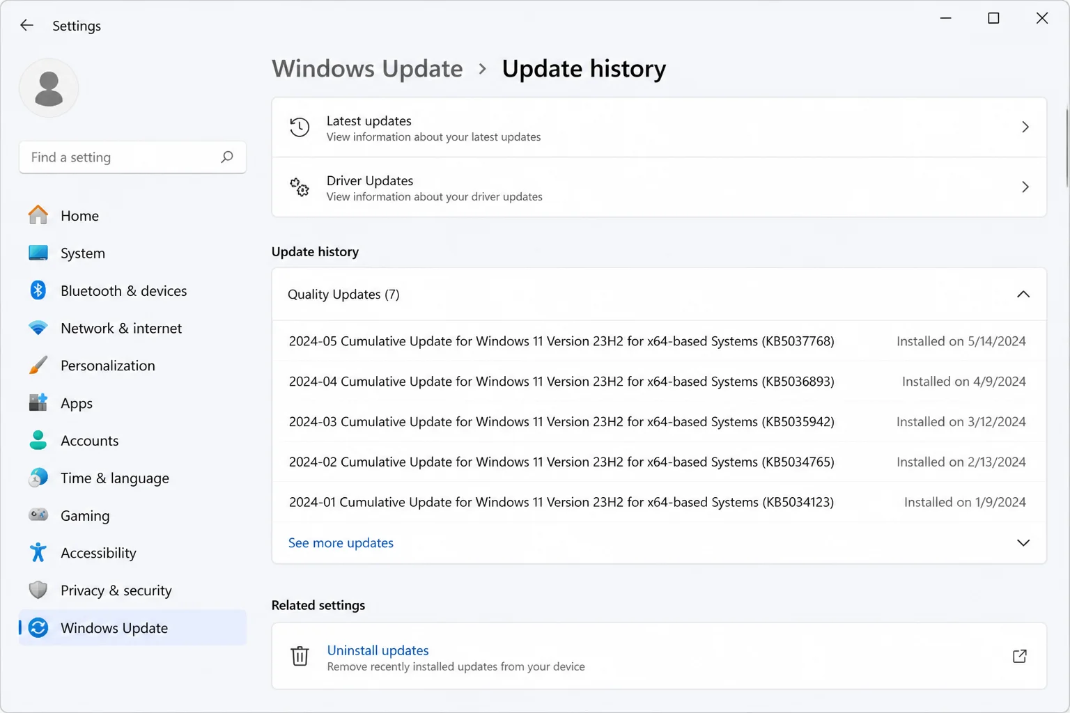 Settings > Windows Update > Update history page listing recently installed updates with KB numbers and install dates, with the Uninstall updates link visible