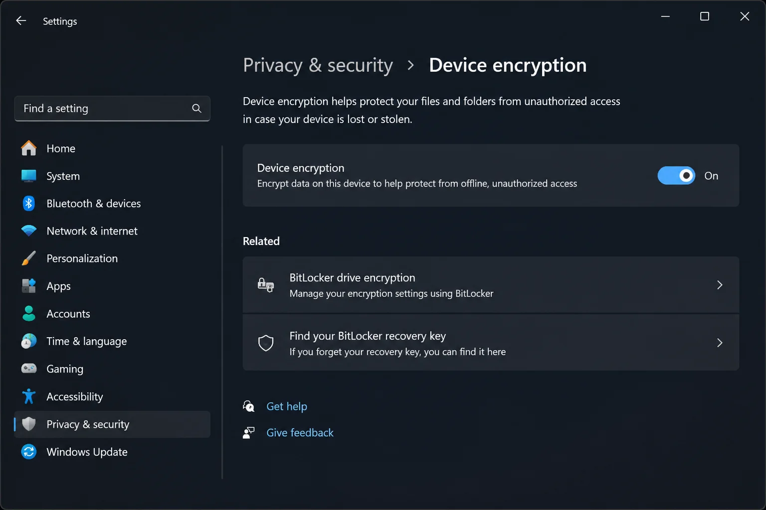 Device encryption status page in Windows 11 Settings showing encryption turned on and the link to back up your recovery key