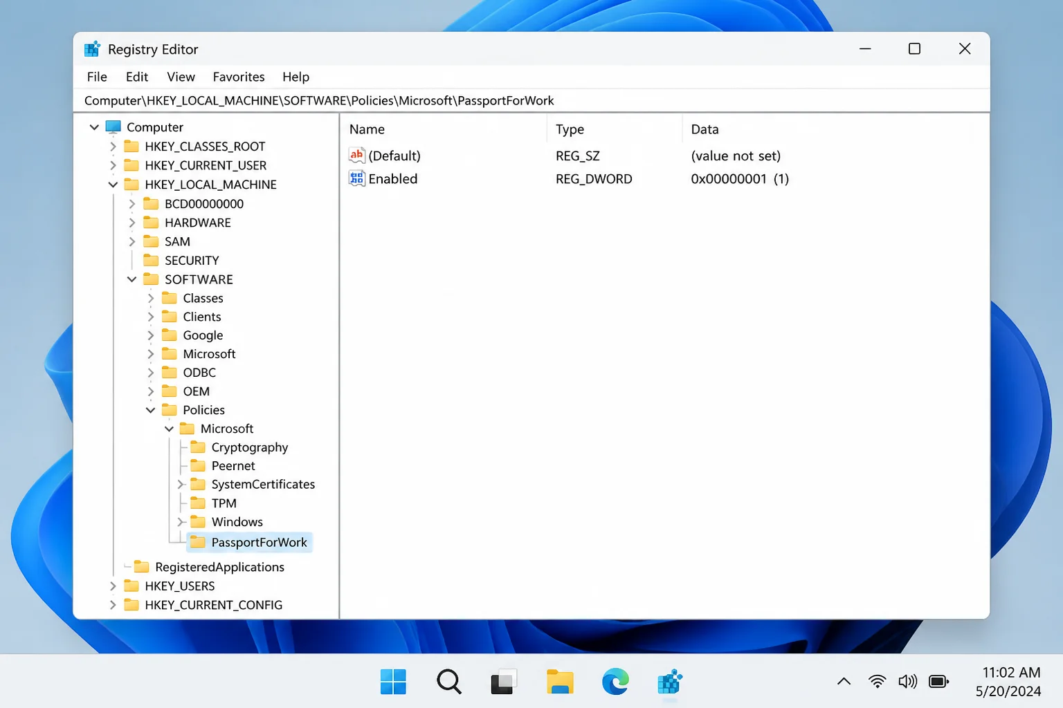 Registry Editor navigated to HKEY_LOCAL_MACHINE\SOFTWARE\Policies\Microsoft\PassportForWork with the key selected in the left pane and the Enabled DWORD value visible in the right pane
