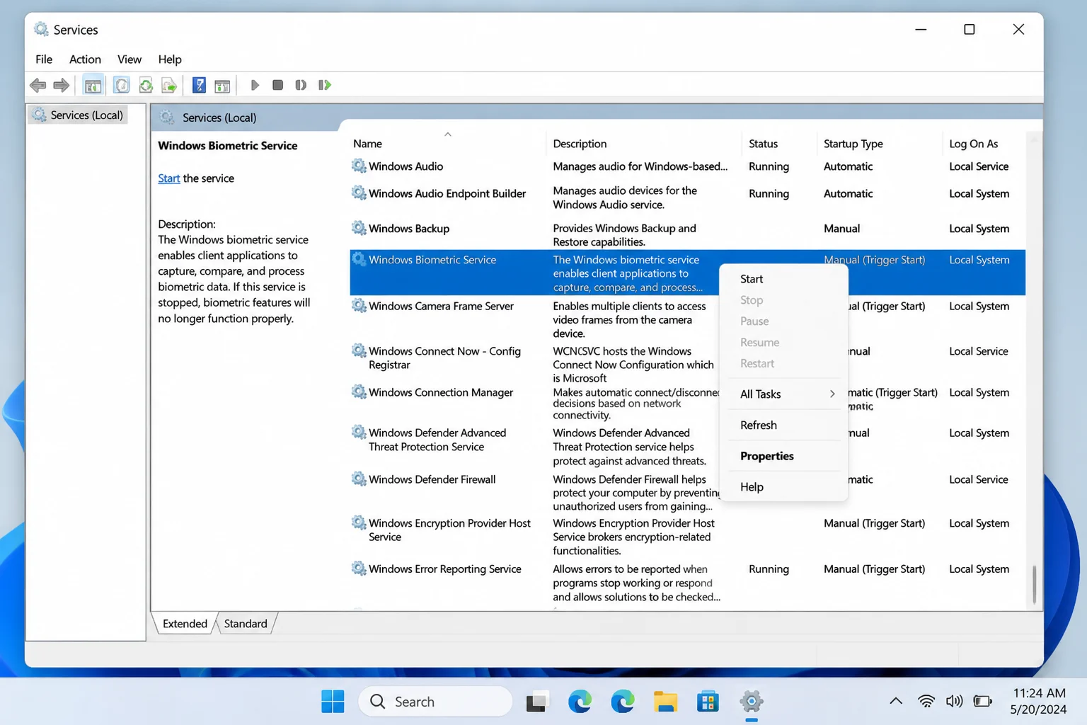 The Services app with Windows Biometric Service highlighted and the right-click context menu showing the Restart option