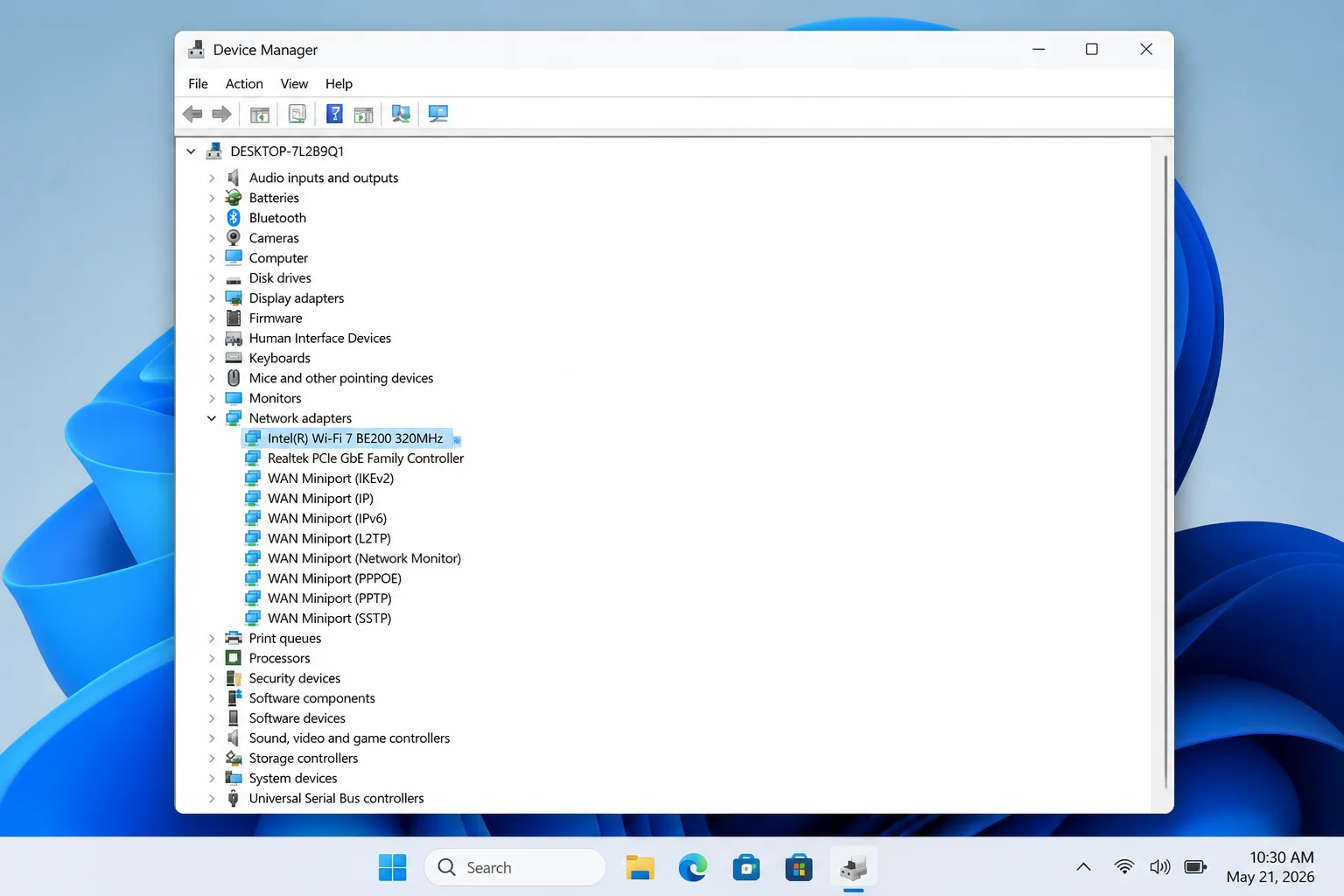 Windows 11 Device Manager with Network adapters expanded and a Wi-Fi adapter highlighted