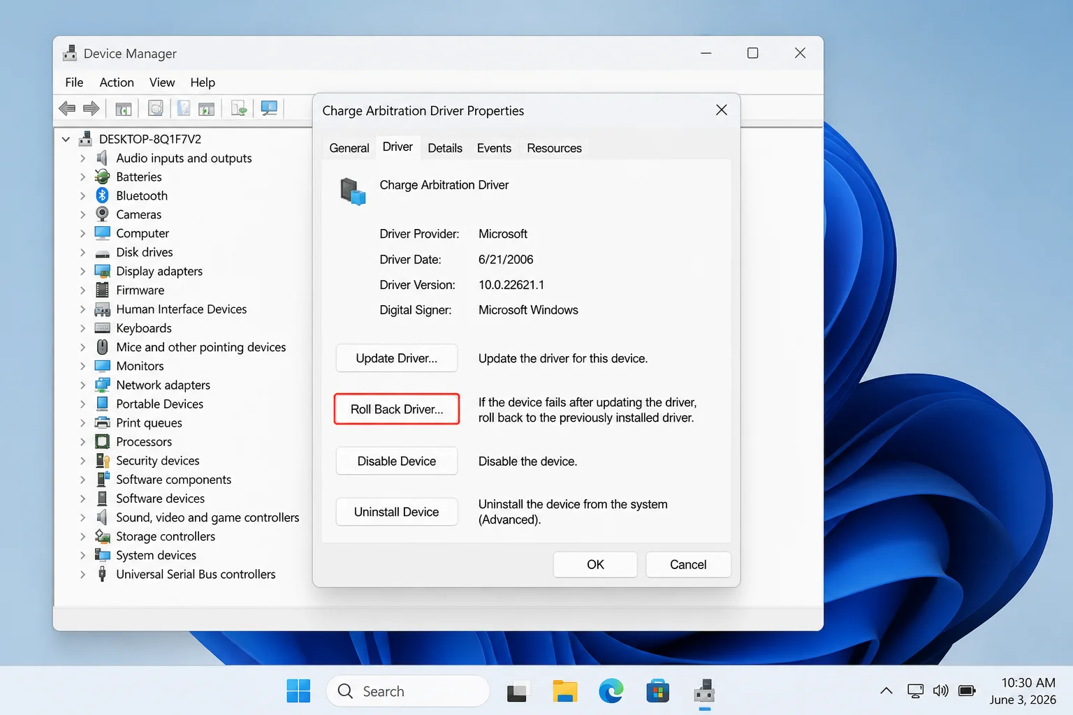 A device Properties dialog with the Driver tab selected and Roll Back Driver highlighted