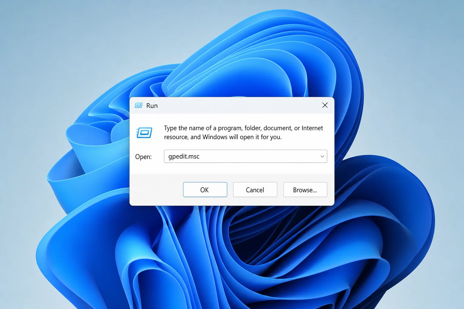 Run dialog with gpedit.msc typed in the Open field on Windows 11