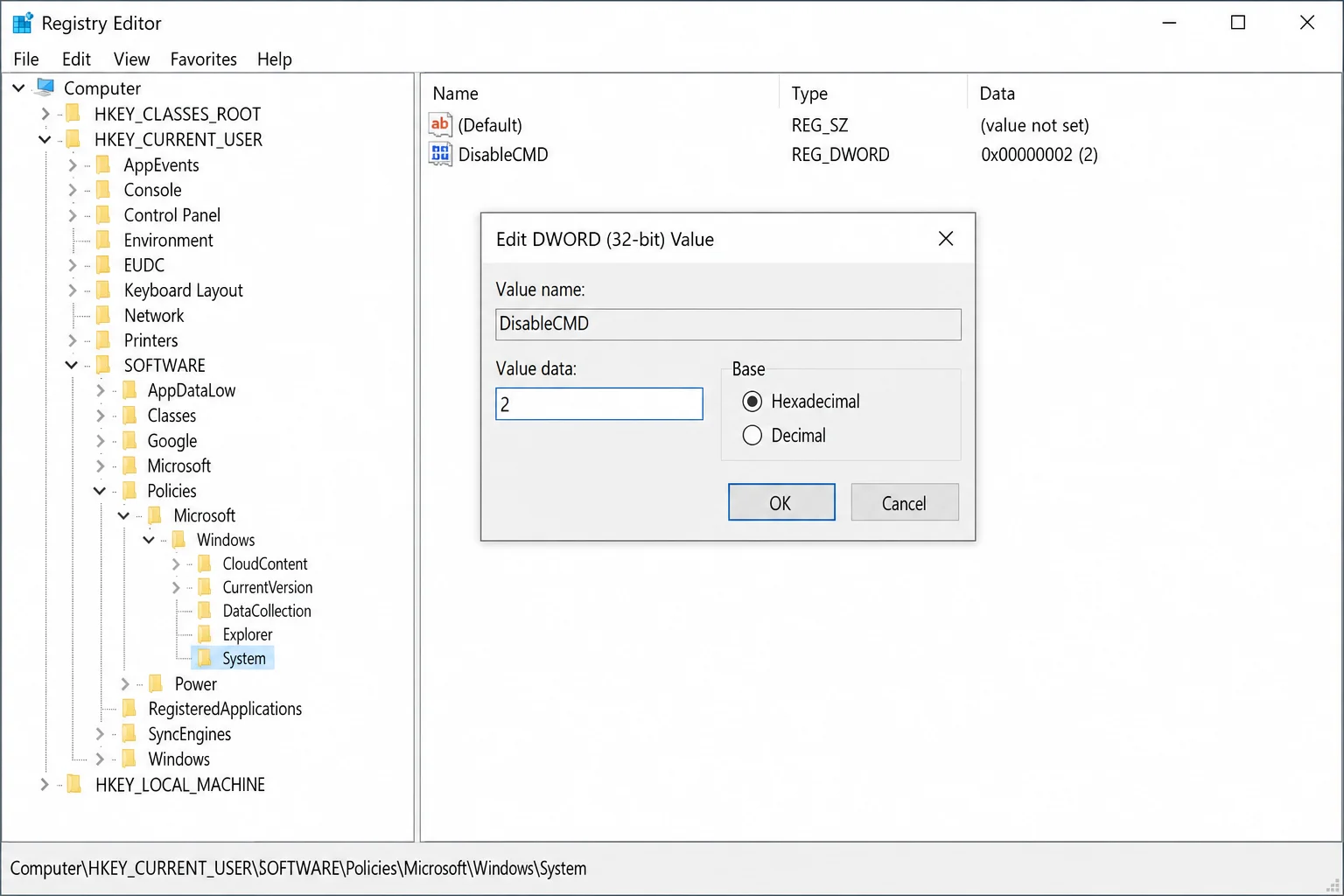Registry Editor showing DisableCMD DWORD value with value data set to 2 under HKEY_CURRENT_USER\Software\Policies\Microsoft\Windows\System
