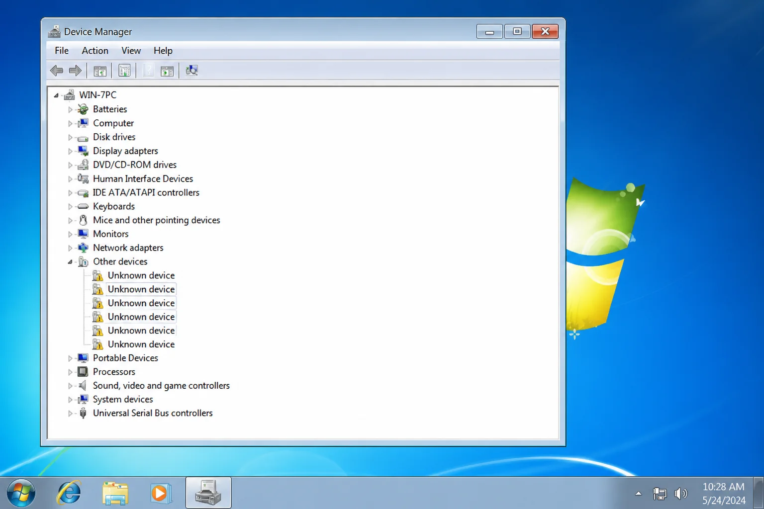 Windows 7 Device Manager showing unknown devices with yellow warning triangles listed under the "Other devices" category