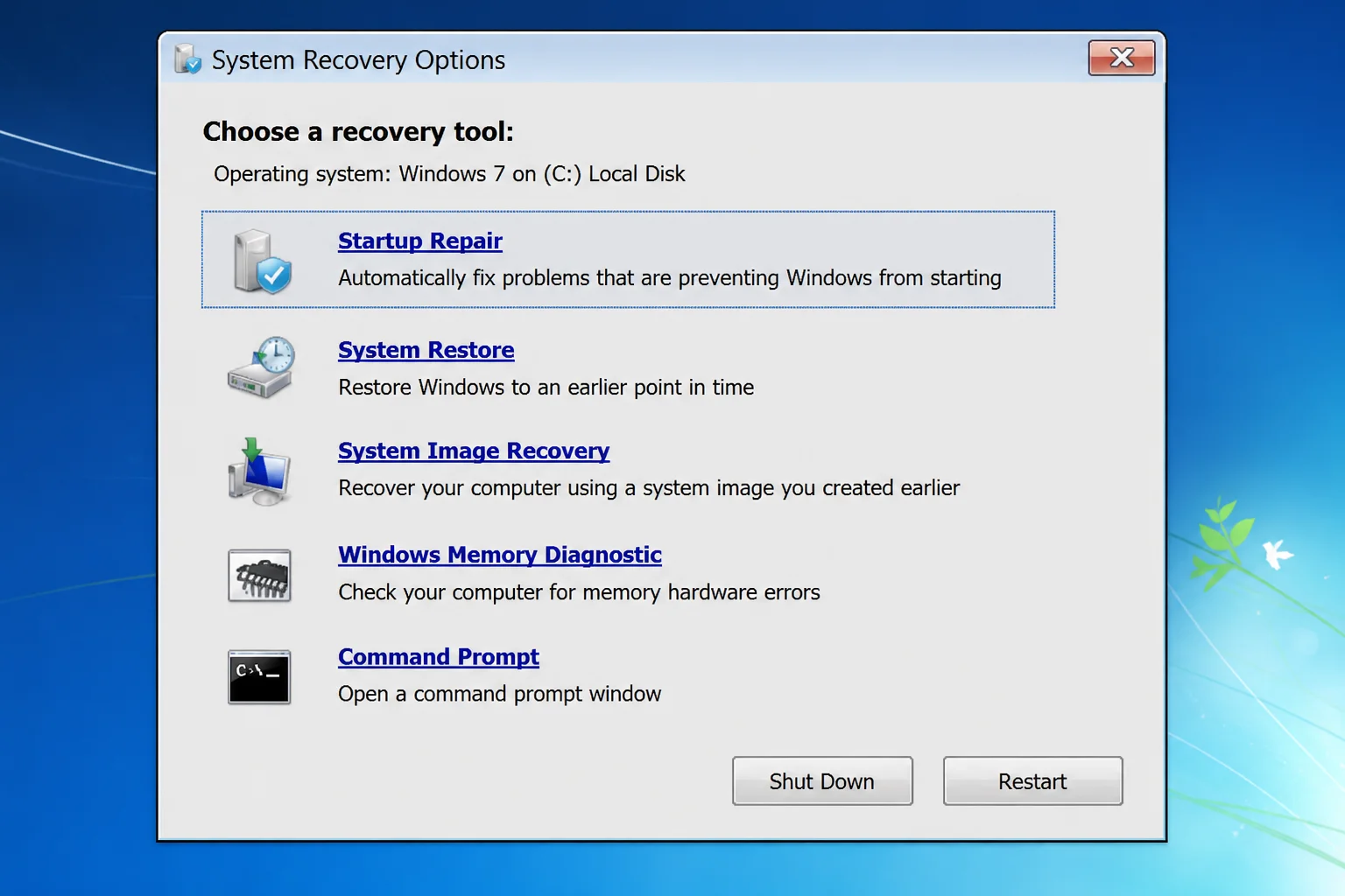 Windows 7 System Recovery Options dialog with the list of recovery tools showing Startup Repair highlighted at the top