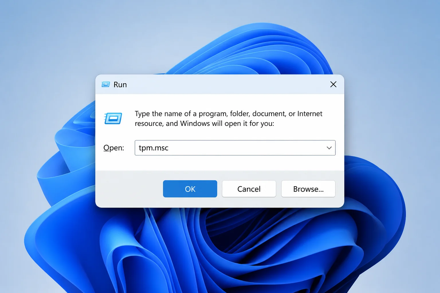 Run dialog with tpm.msc entered and the OK button highlighted