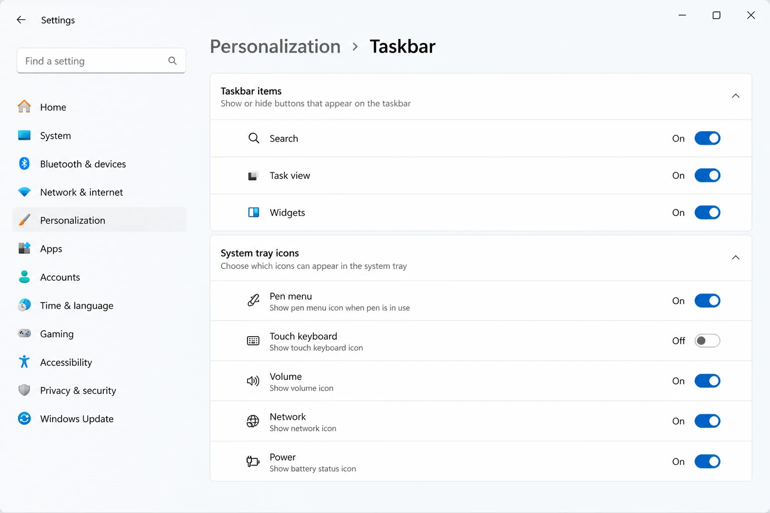 Windows 11 Settings > Personalization > Taskbar showing the Taskbar items and System tray icons sections with toggle switches