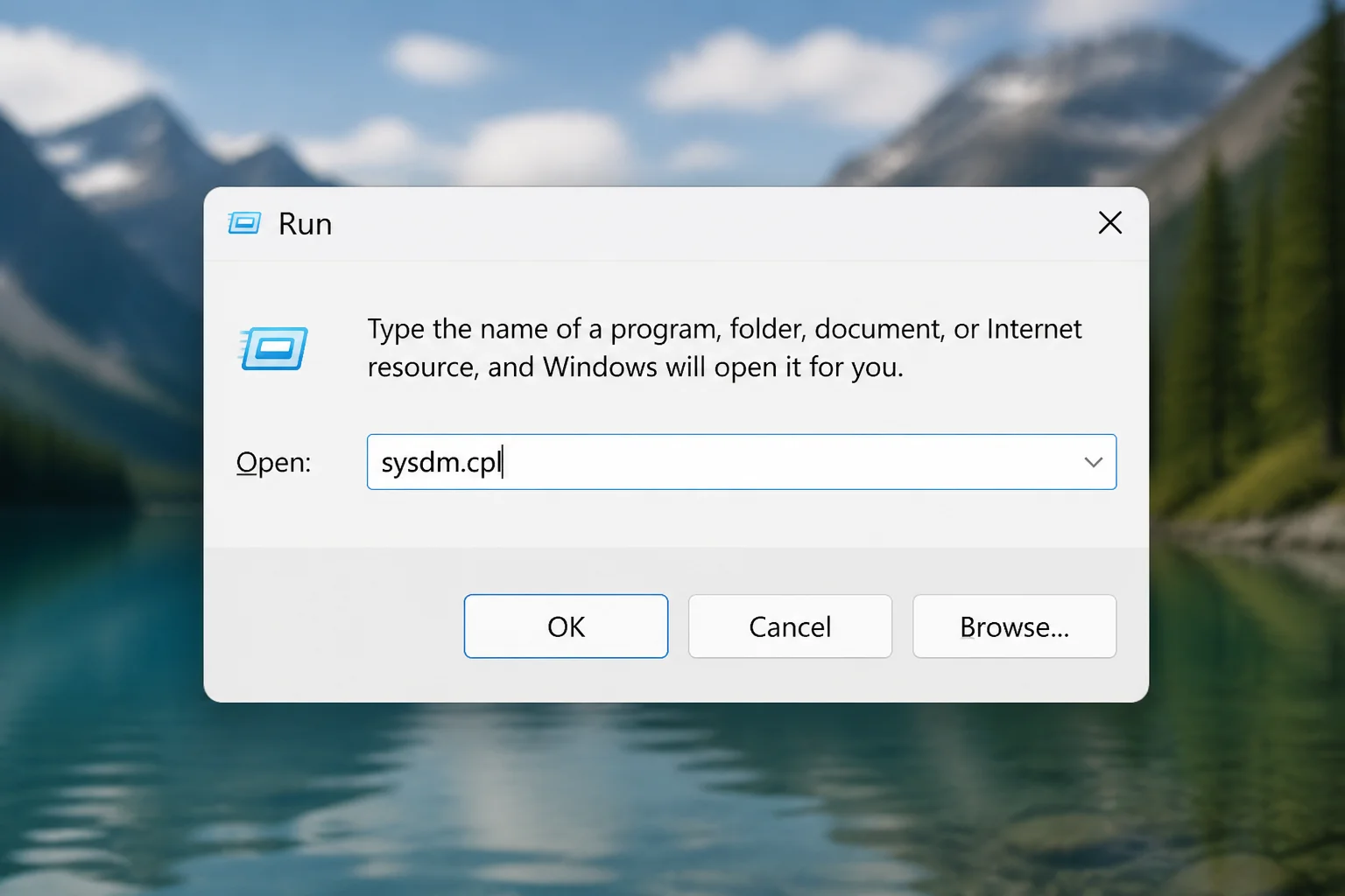 Run dialog with "sysdm.cpl" typed in the Open field