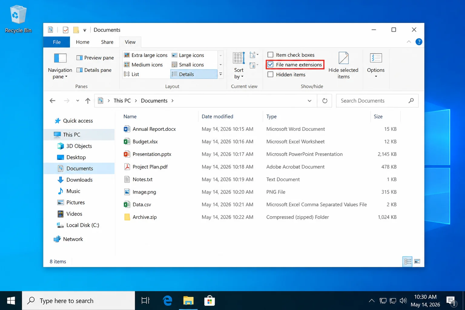 Windows 10 File Explorer View tab with the File name extensions checkbox highlighted