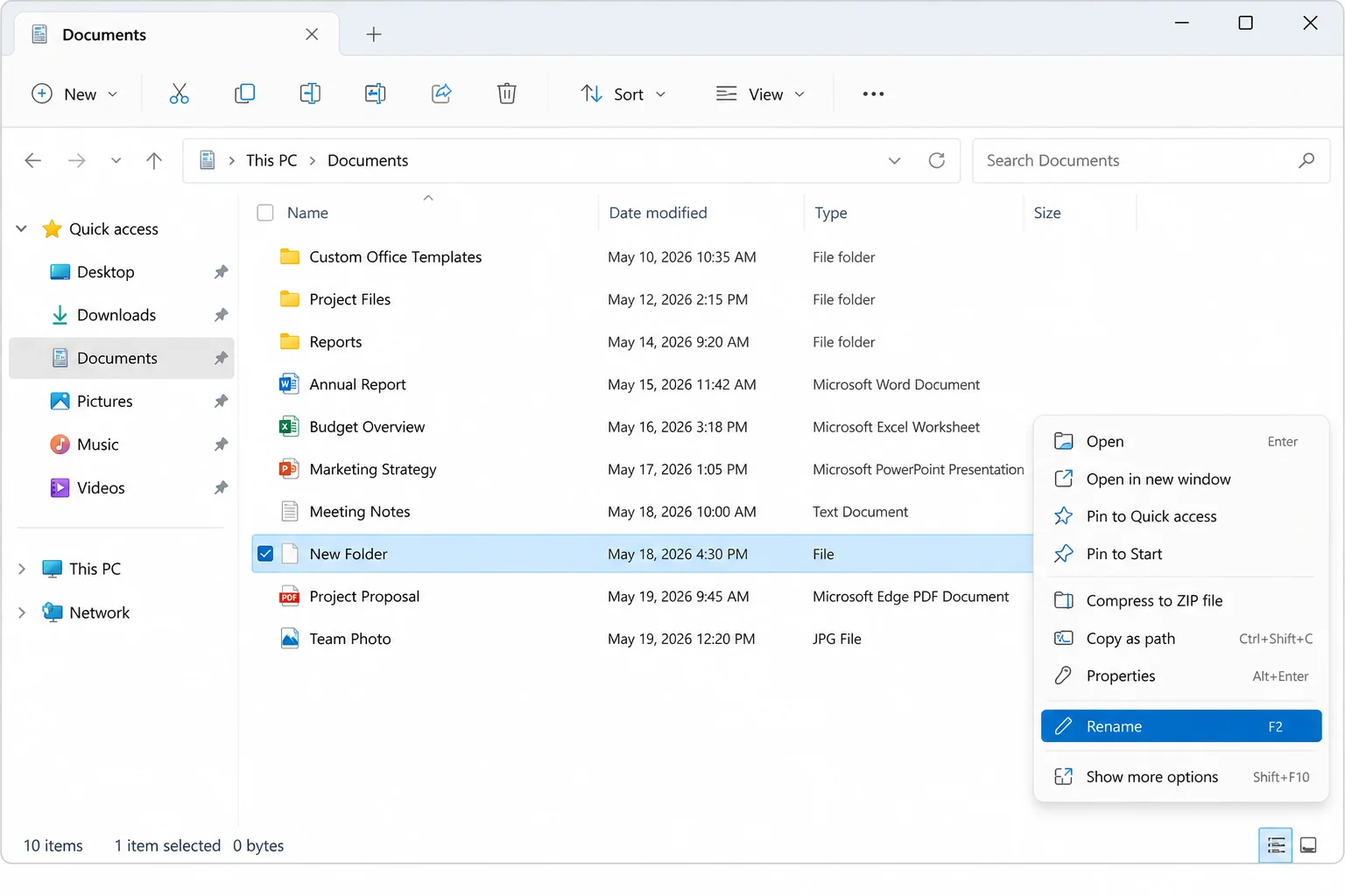 Windows 11 File Explorer with an extensionless file selected and Rename highlighted in its context menu
