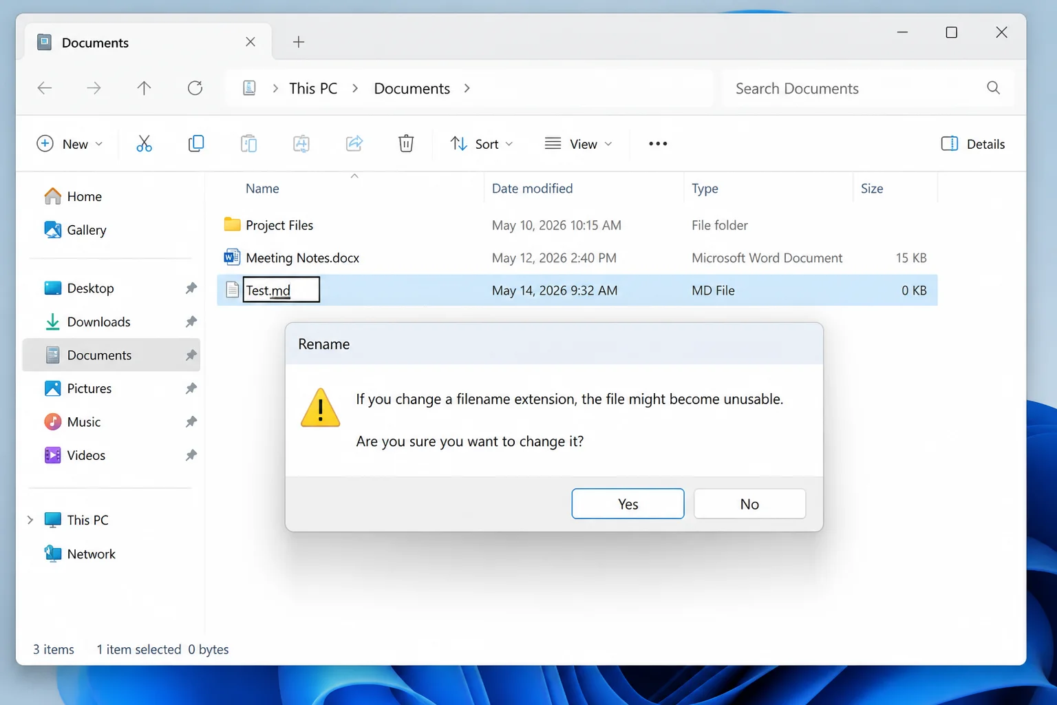 Full Windows warning dialog stating that changing a file name extension might make the file unusable, with Yes and No buttons visible