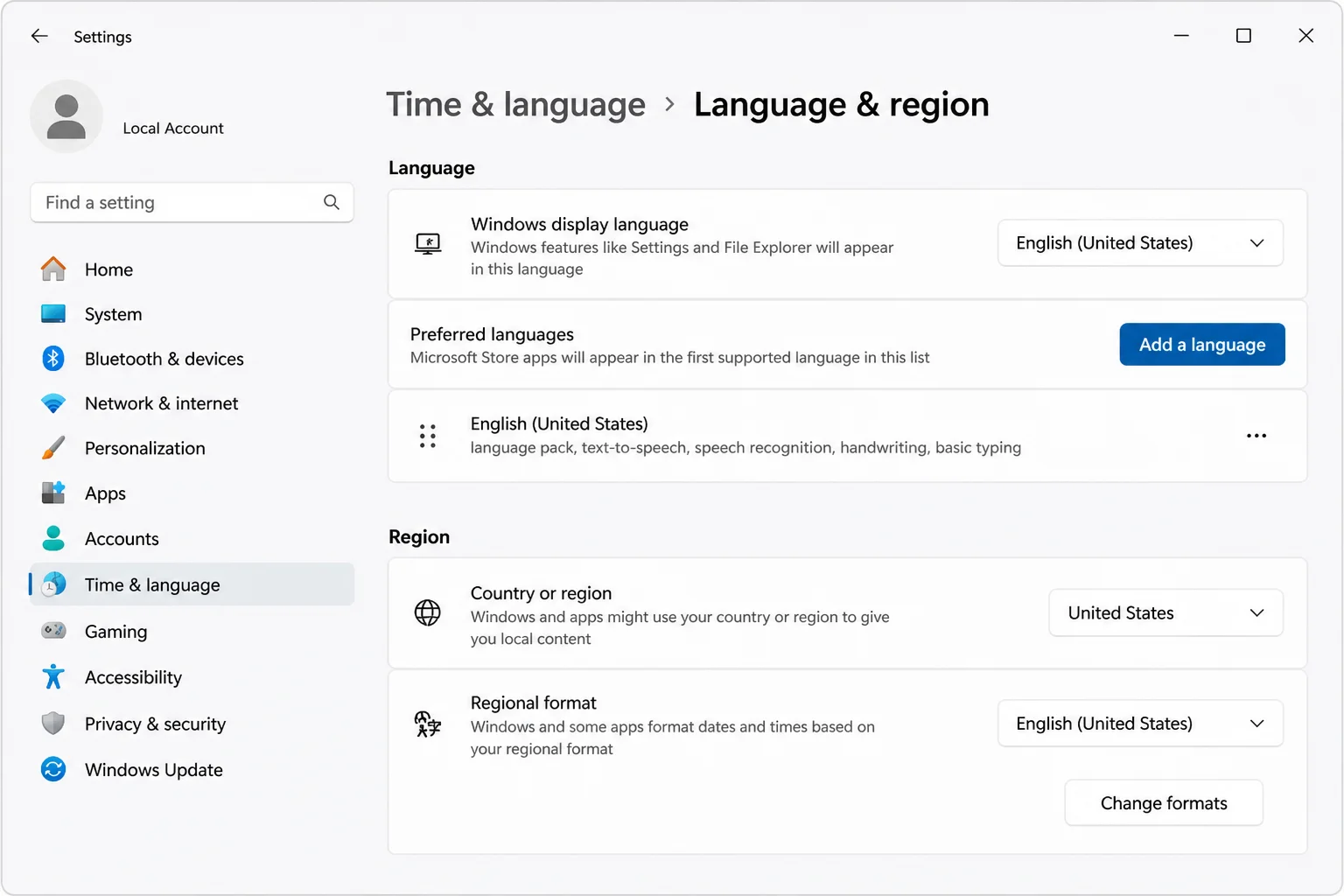Windows 11 Settings > Time & language > Language & region with the Regional format section visible