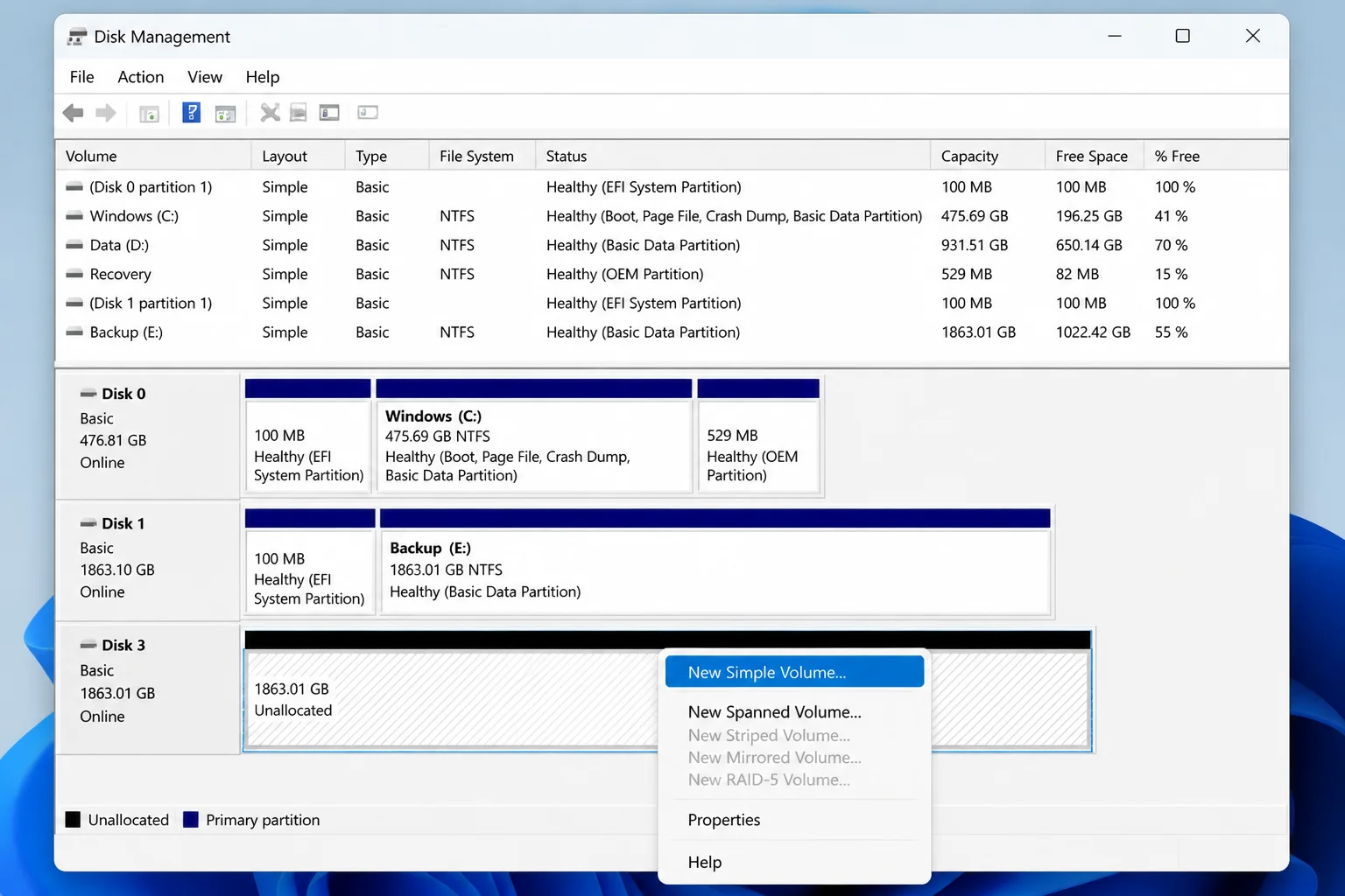 Windows 11 Disk Management showing unallocated VHDX space with New Simple Volume highlighted in the right-click menu