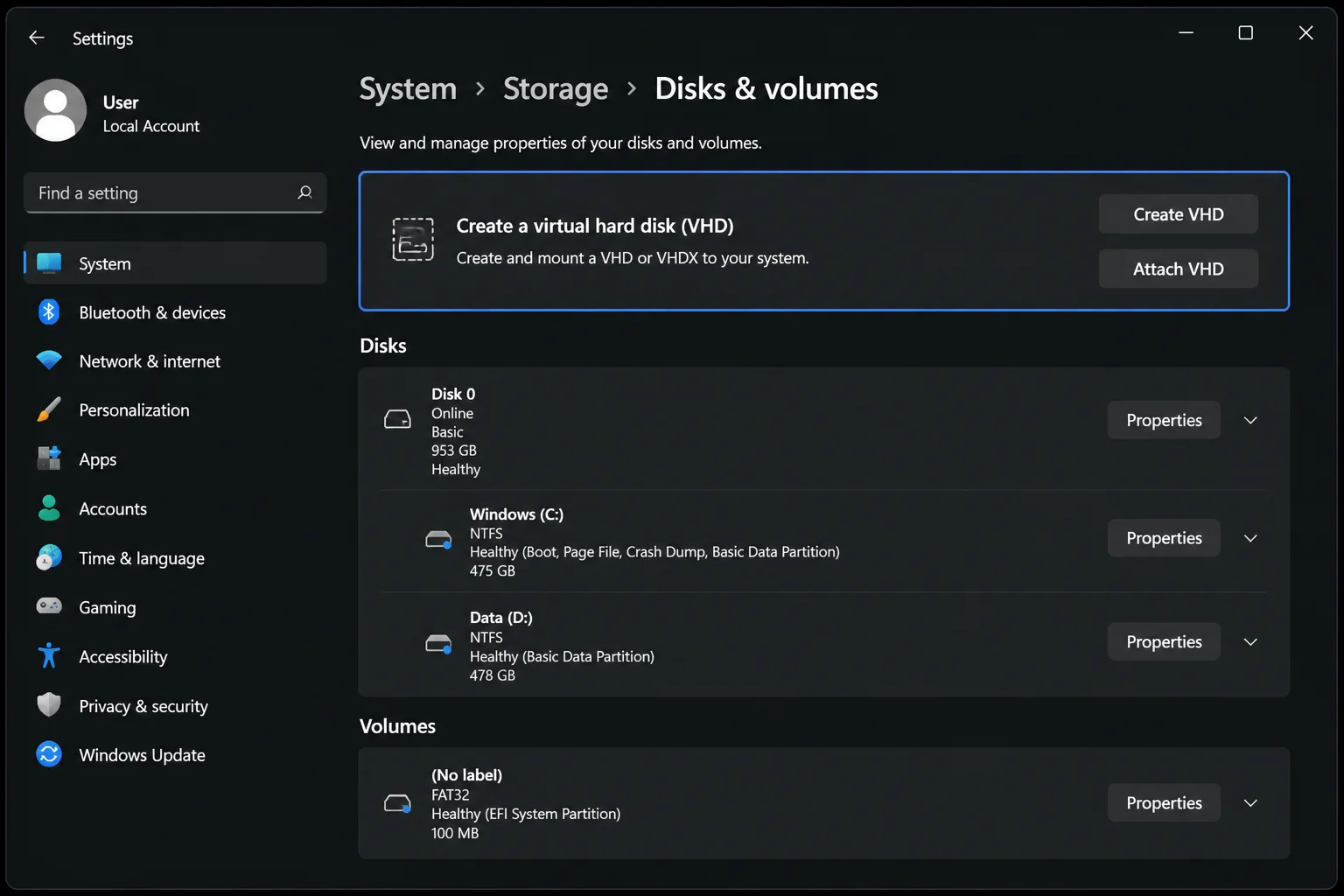Windows 11 Settings at System > Storage > Advanced storage settings > Disks & volumes with Create VHD highlighted