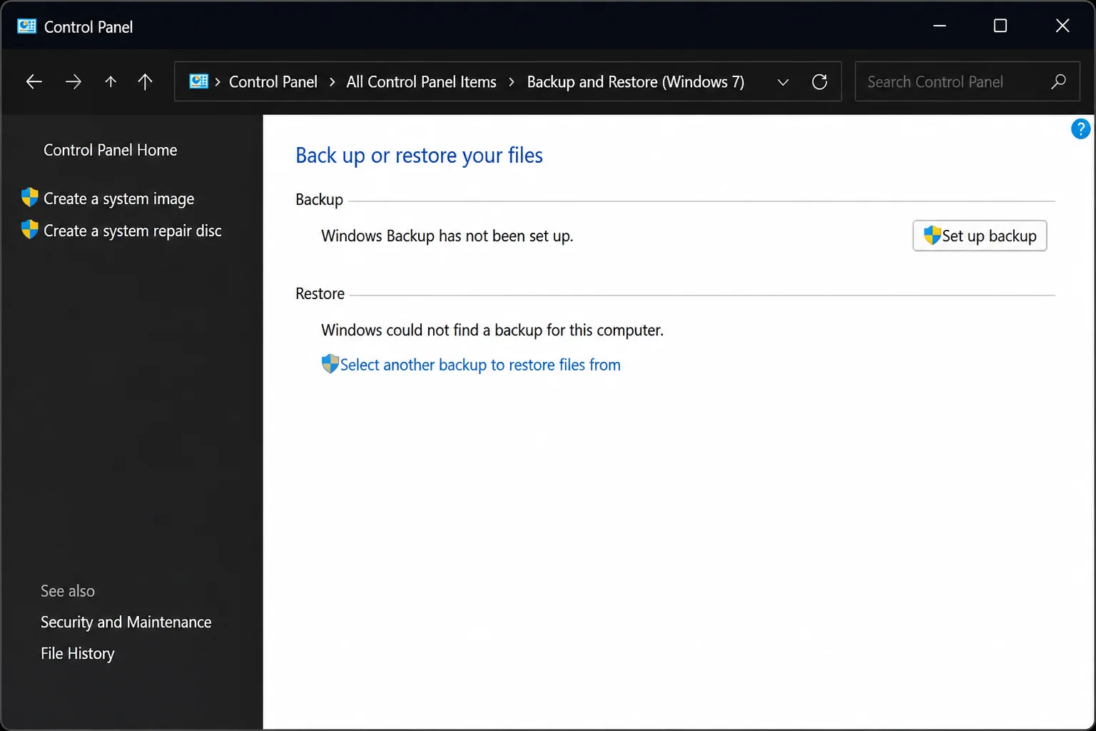Windows 11 Control Panel showing Backup and Restore (Windows 7) with Create a system image visible