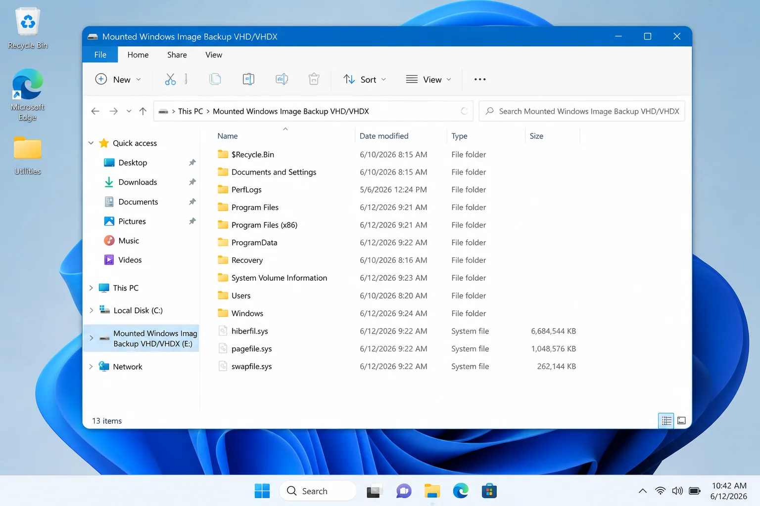Windows 11 File Explorer showing the contents of an attached VHDX drive