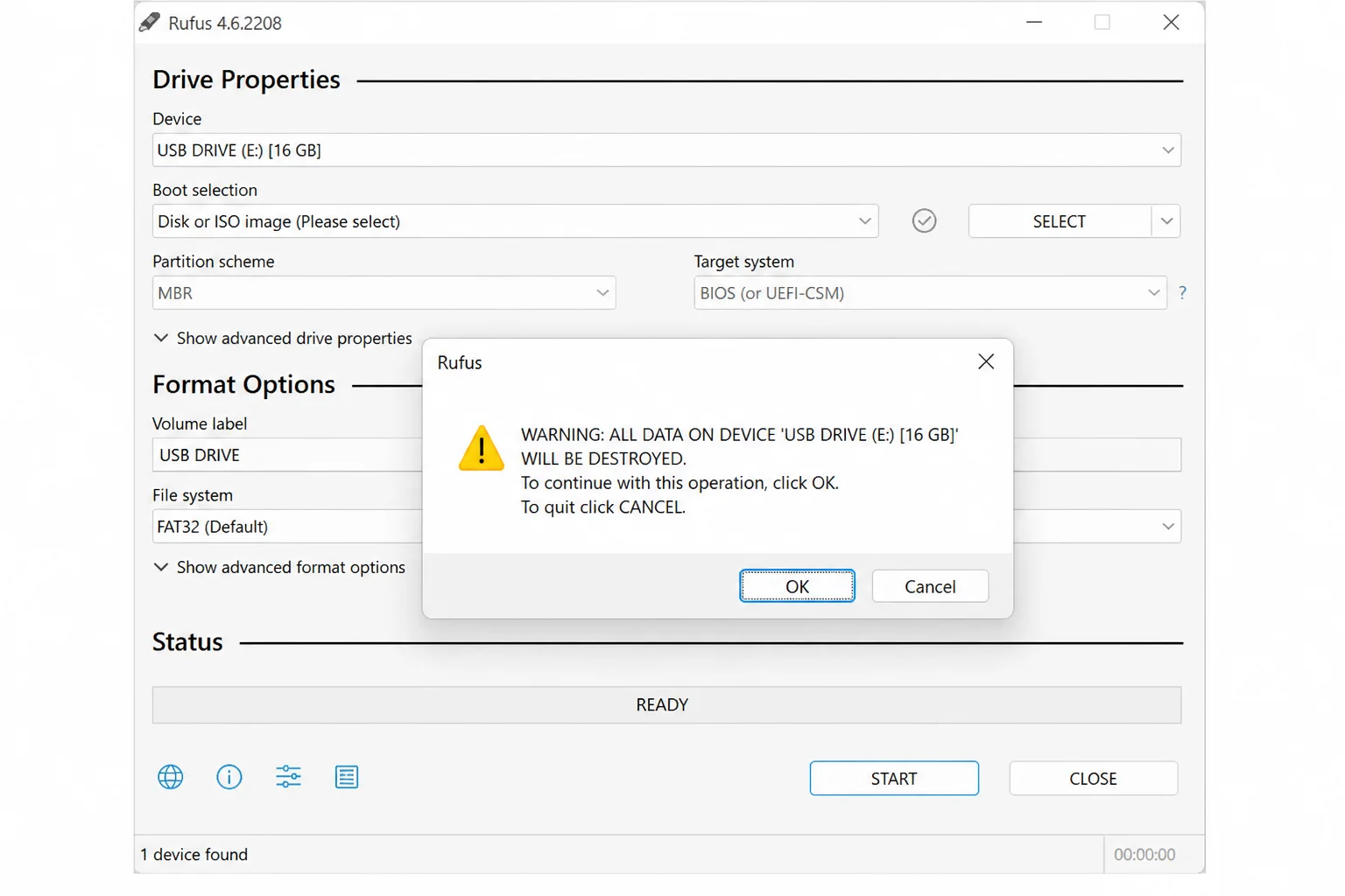Rufus USB erasure warning with the selected drive name, data-destruction message, and Cancel button highlighted